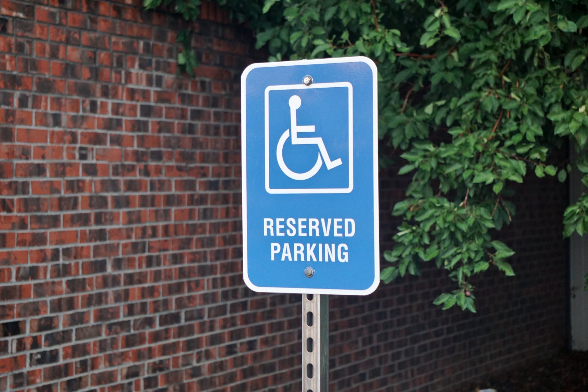 reserved parking sign for pwd
